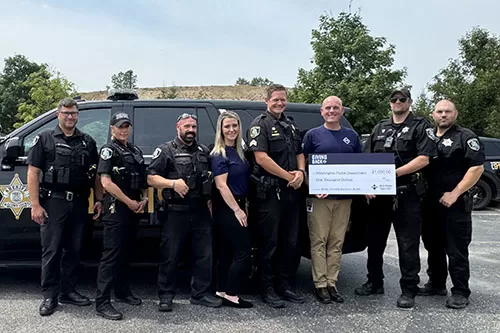 MSGCU's Shelby Township Branch at 26 and Van Dyke presents a donation to Washington Twp Police Department